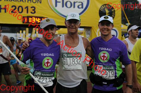 A Dad and two sons finishing the 2014 Comrades Marathon together.
