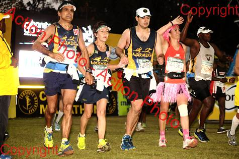 Another family tripod finishing the 2014 Comrades Marathon together.